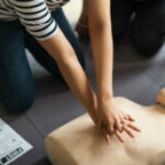 Healthcare training demonstrating cardiac arrest procedures